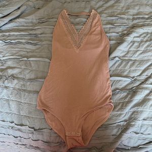 American eagle strapless neckline bodysuit size XS pink with lace